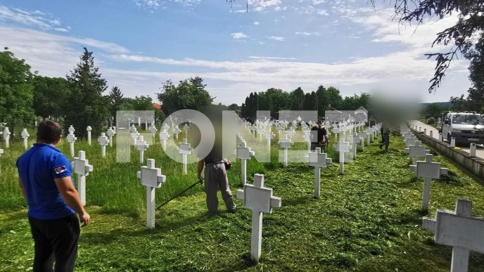 Čišćenje vojnog groblja 